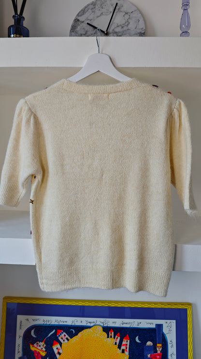 Cardigan mezza manica con applicazioni paillettes  -50%