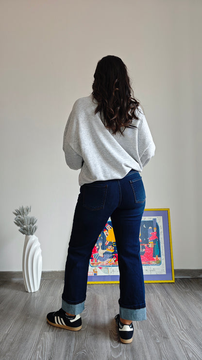 Jeans dritto a vita bassa con risvolto
